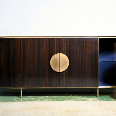 Walnut veneer sideboard with glossy finish and brass details